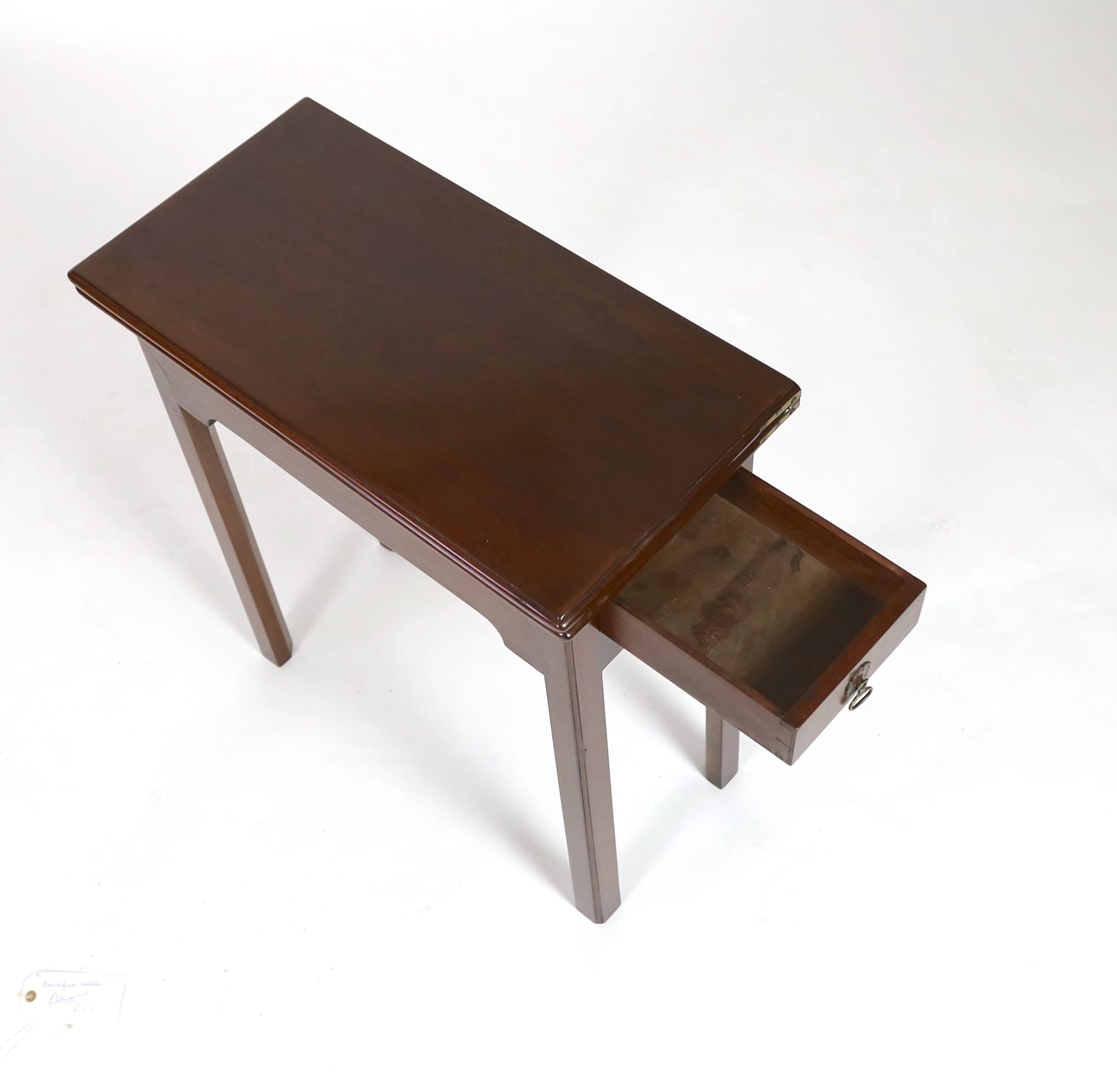 A reproduction George III style rectangular mahogany folding tea table, width 63cm depth 32cm height 73cm